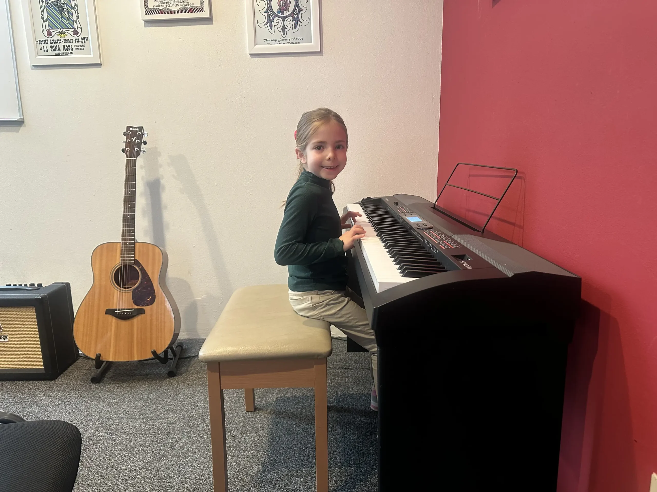 IMG_3100-scaled Courtesy photo: Aviva at her very first piano lesson at The Candyman Strings & Things—small hands on the keys, beginning a beautiful musical journey.