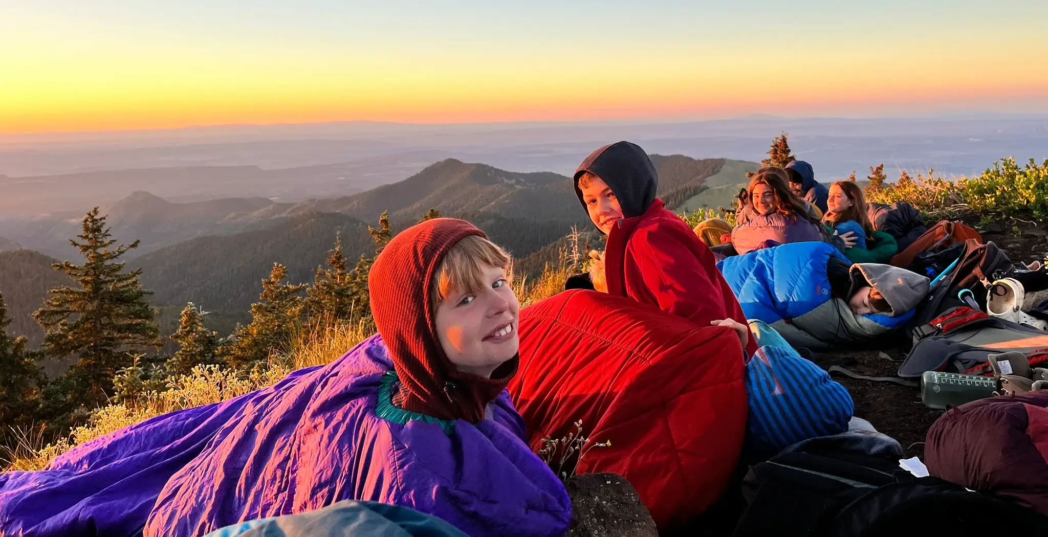 henry on top of Mt Taylor for a sunrise summit vista David’s youngest son, Henry, (far left) on top of Mount Taylor.